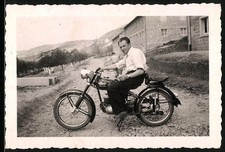 Fotografie Mann auf seinem